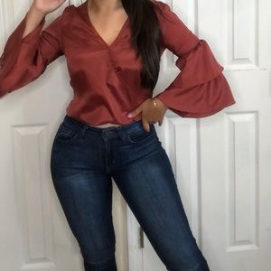 Burnt red colored top